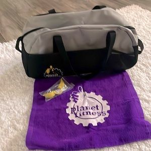 Brand new Planet Fitness bag . Includes towel and tanning goggles.  Retail $15